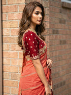 Sophisticated Coral Pink Striped Pattern Georgette Saree With Floral Thread Embroidered Border