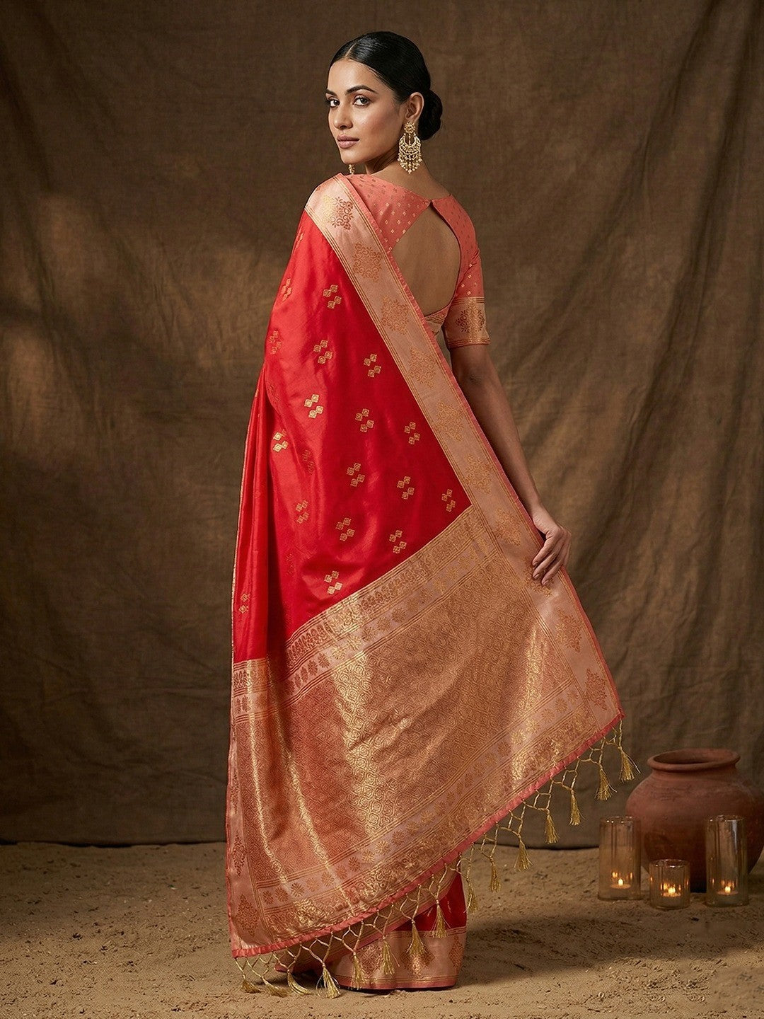Elegant Red Floral Motif Silk Blend Saree Featuring Intricate Zari Weaving With Tassel Pallu