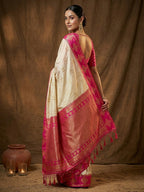 Elegant Cream Floral Motif Silk Blend Saree Featuring Intricate Zari Weaving With Tassel Pallu