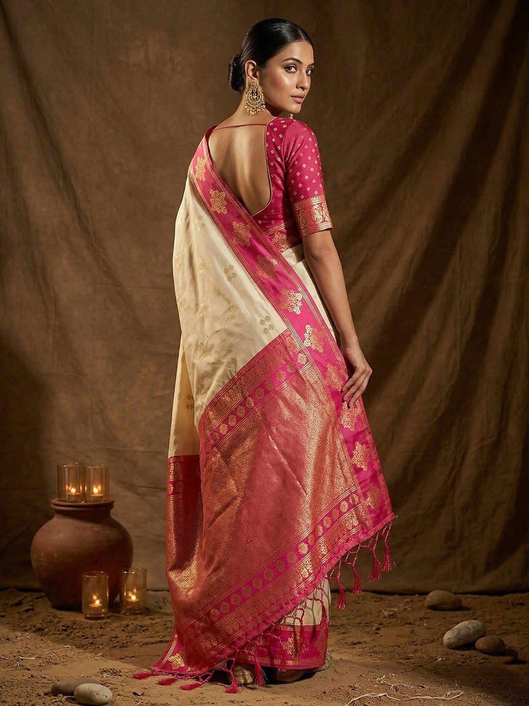Elegant Cream Floral Motif Silk Blend Saree Featuring Intricate Zari Weaving With Tassel Pallu