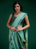 Designer Turquoise Jamdani Cotton Silk Saree With Floral Zari Weaving & Tassel Pallu