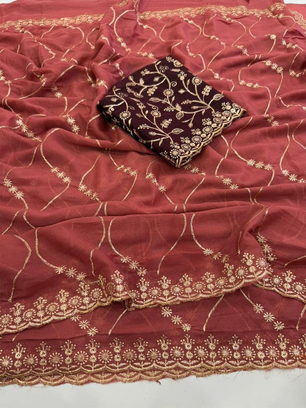 Sophisticated Coral Red Georgette Saree Showcasing Sequins & Golden Thread Embroidery