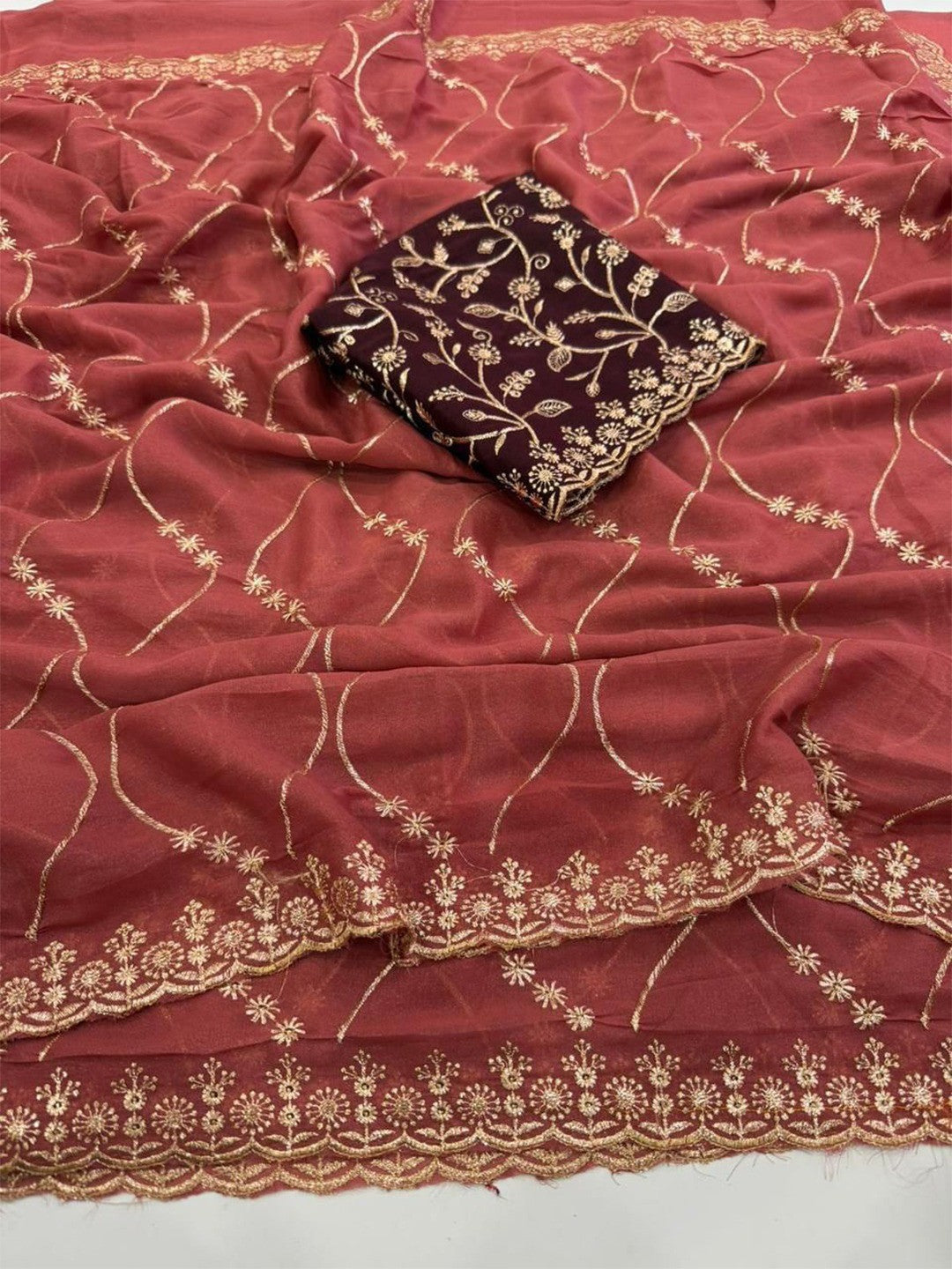 Sophisticated Coral Red Georgette Saree Showcasing Sequins & Golden Thread Embroidery