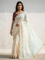 Sophisticated Offwhite Georgette Saree Showcasing Sequins & Golden Thread Embroidery