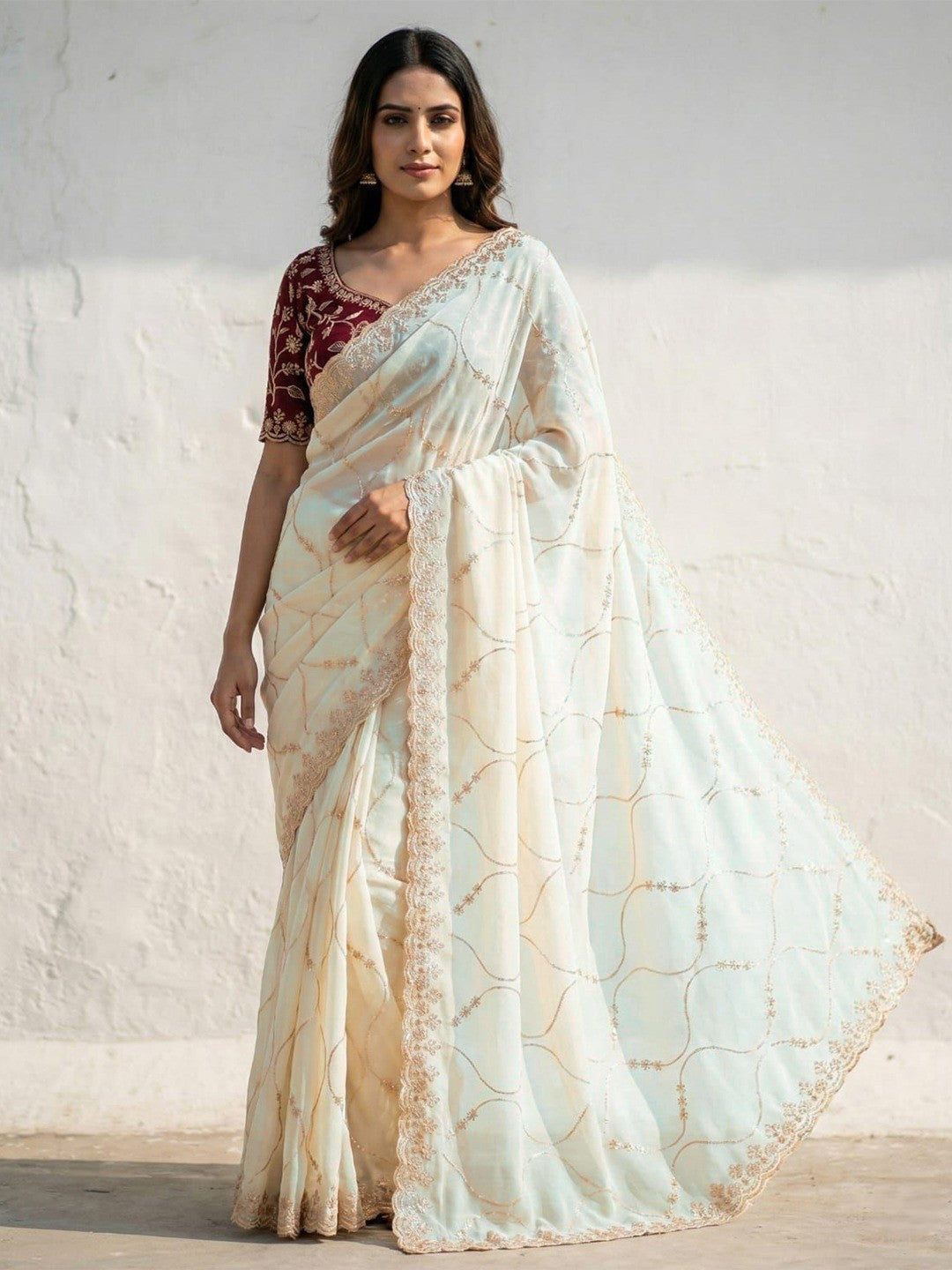 Sophisticated Offwhite Georgette Saree Showcasing Sequins & Golden Thread Embroidery