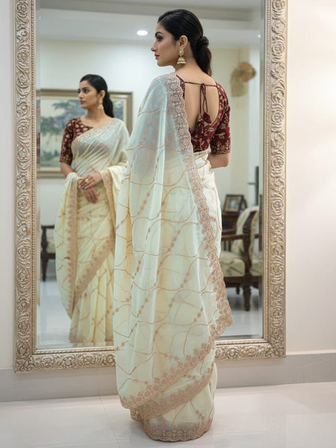 Sophisticated Offwhite Georgette Saree Showcasing Sequins & Golden Thread Embroidery