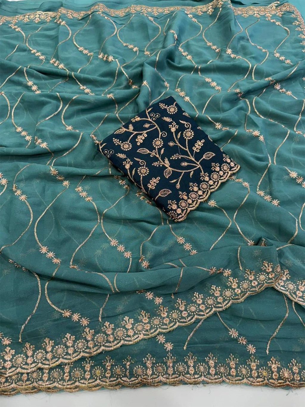 Sophisticated Teal Georgette Saree Showcasing Sequins & Golden Thread Embroidery