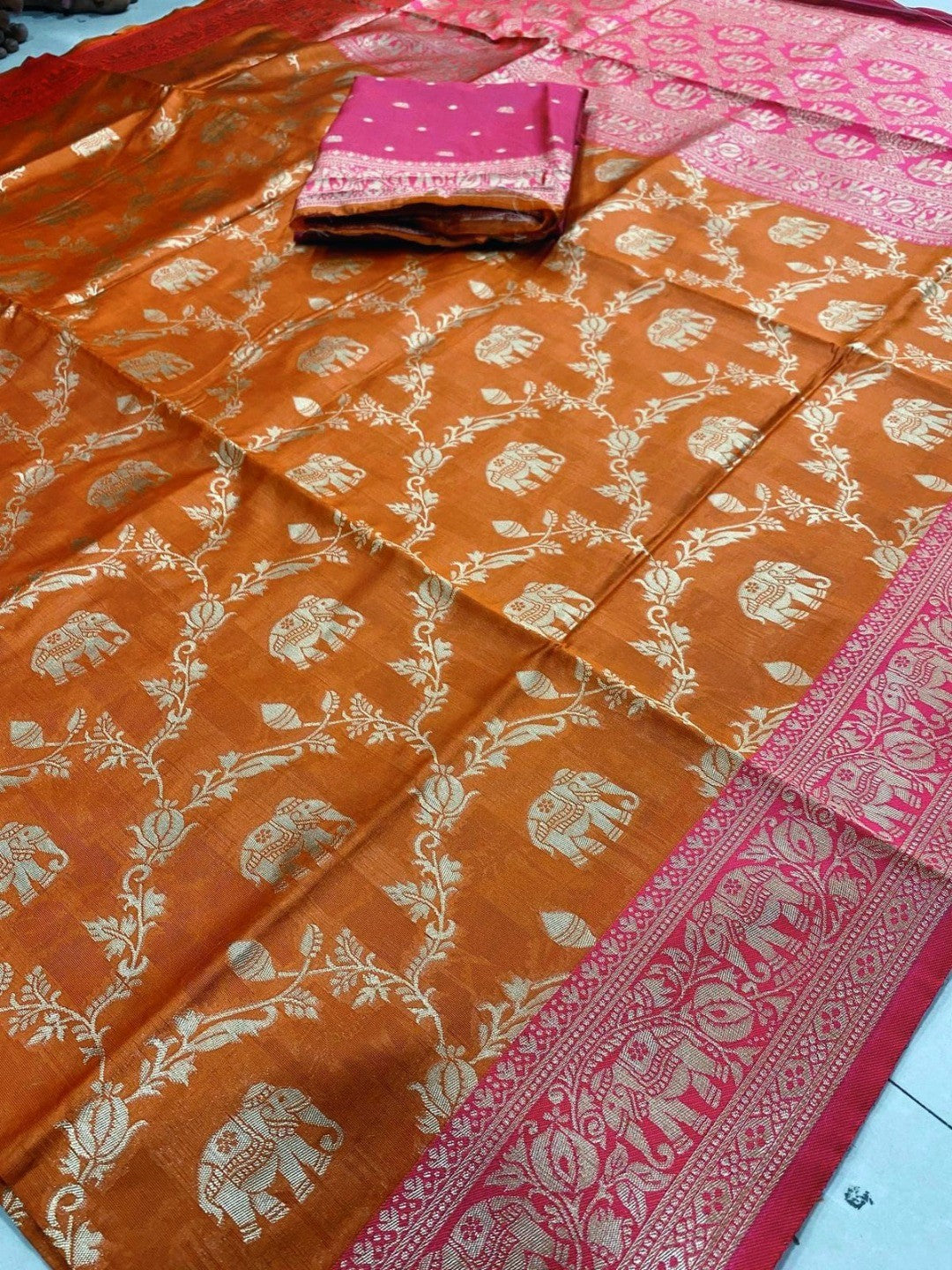 Elegant Orange Silk Blend Woven Zari Saree with Intricate Elephant Motifs