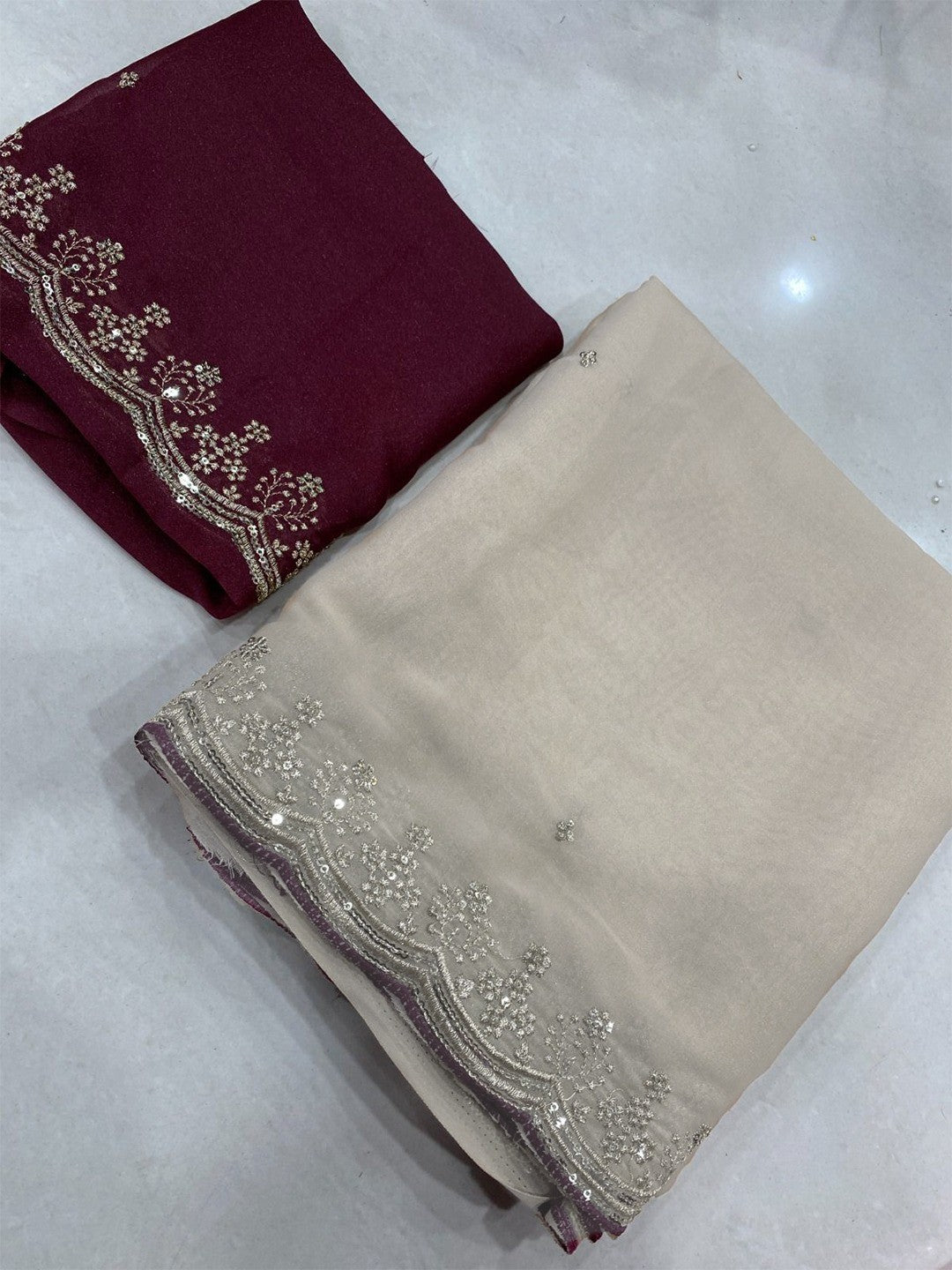 Luxurious Cream Georgette Saree with Sequins Butti and Scalloped Border