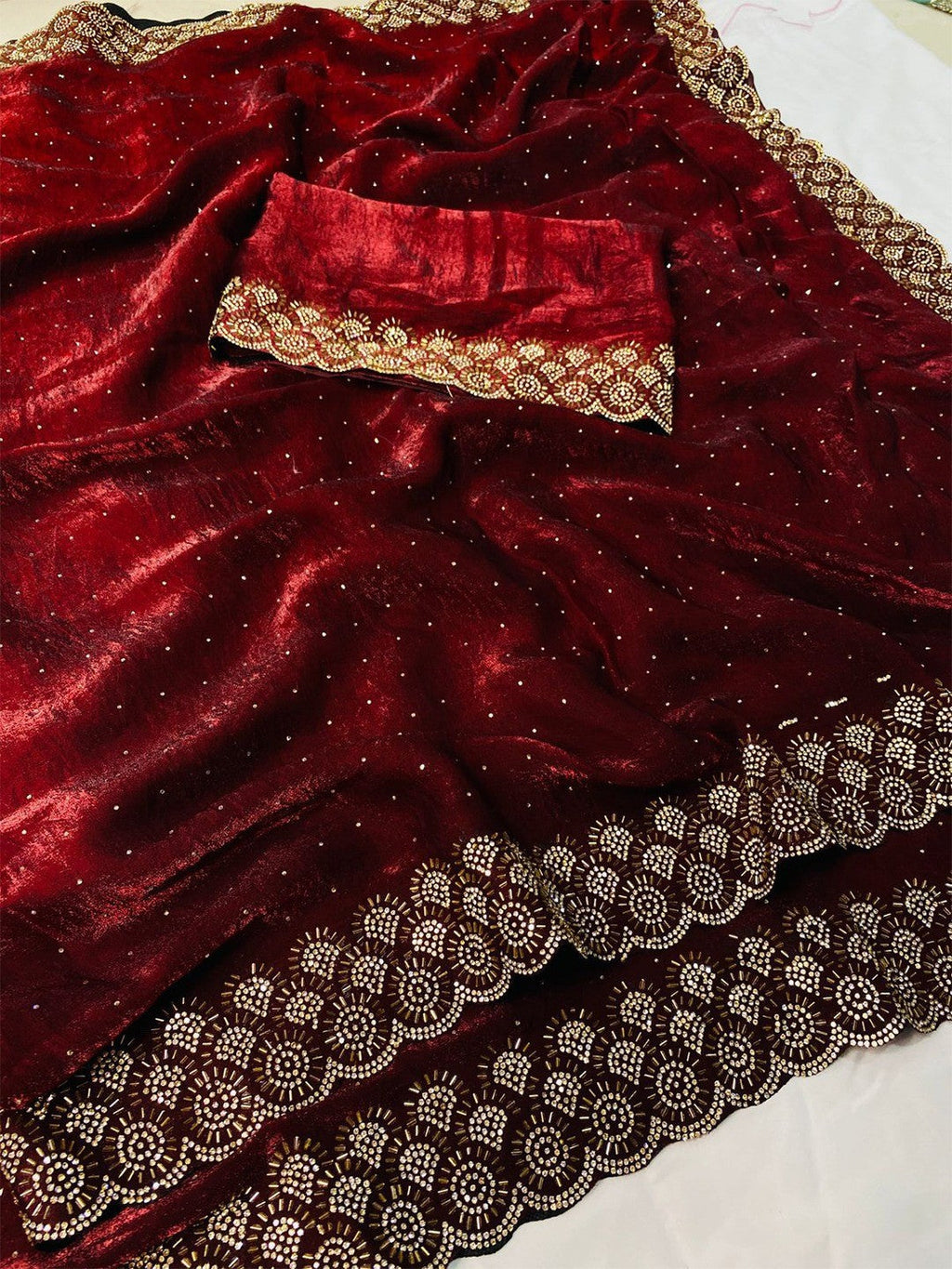 Graceful Maroon Silk Blend Saree Accented With Swarovski Stone Work & Delicate Lace Border