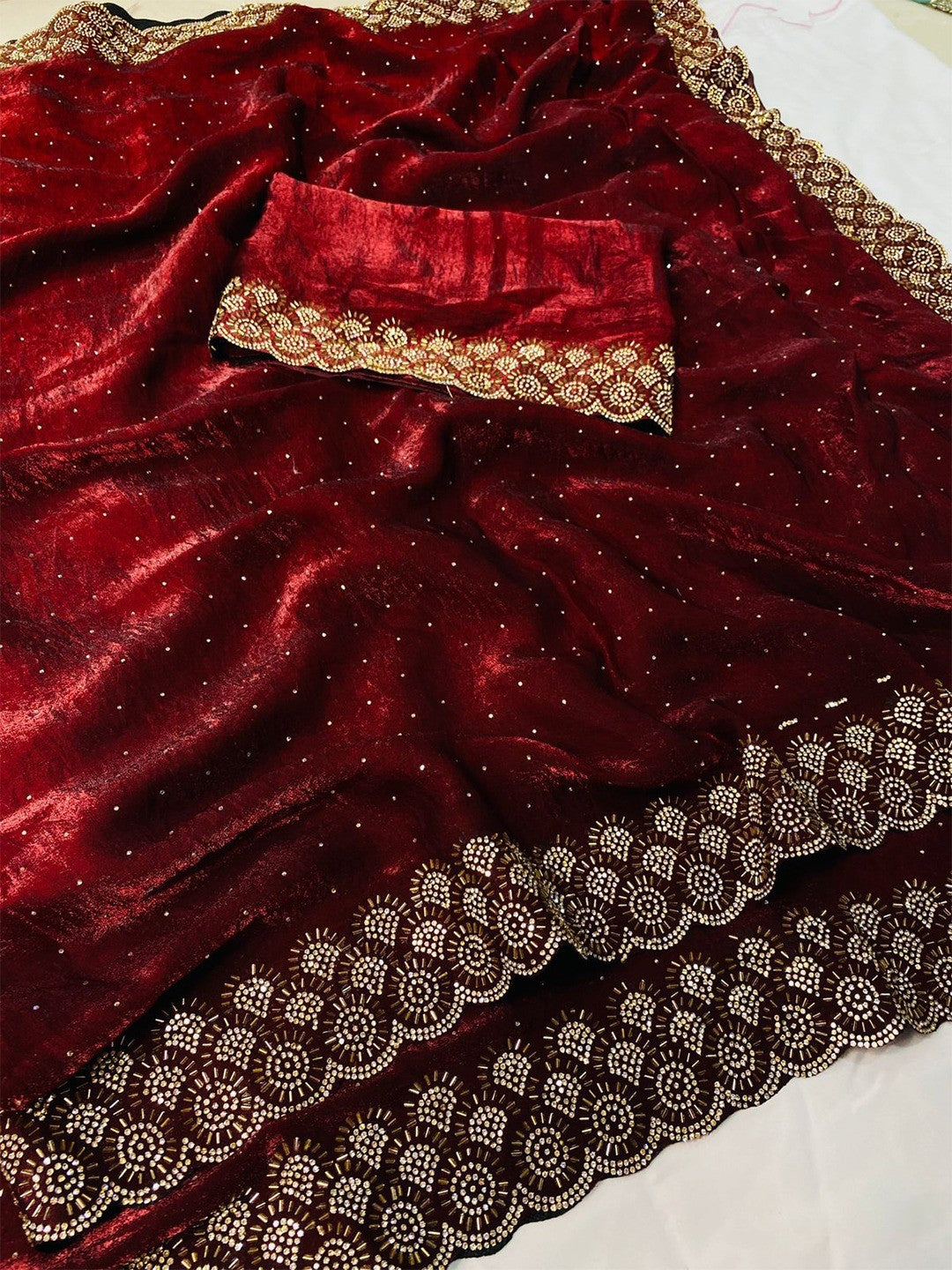 Graceful Maroon Silk Blend Saree Accented With Swarovski Stone Work & Delicate Lace Border