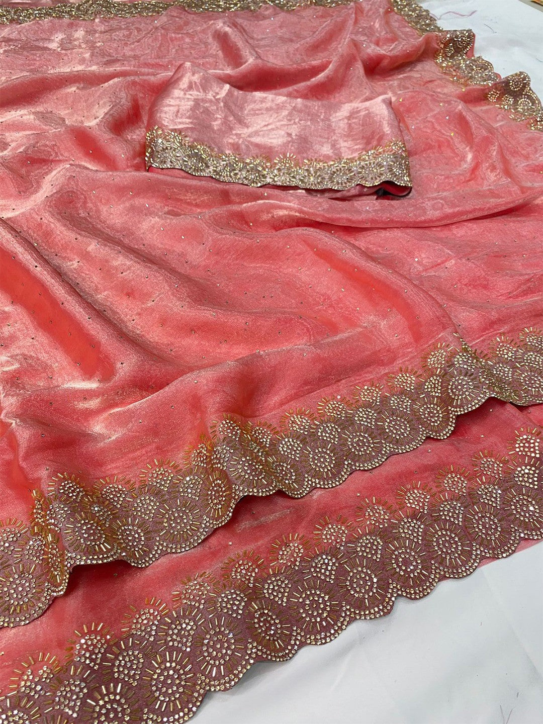 Graceful Peach Silk Blend Saree Accented With Swarovski Stone Work & Delicate Lace Border