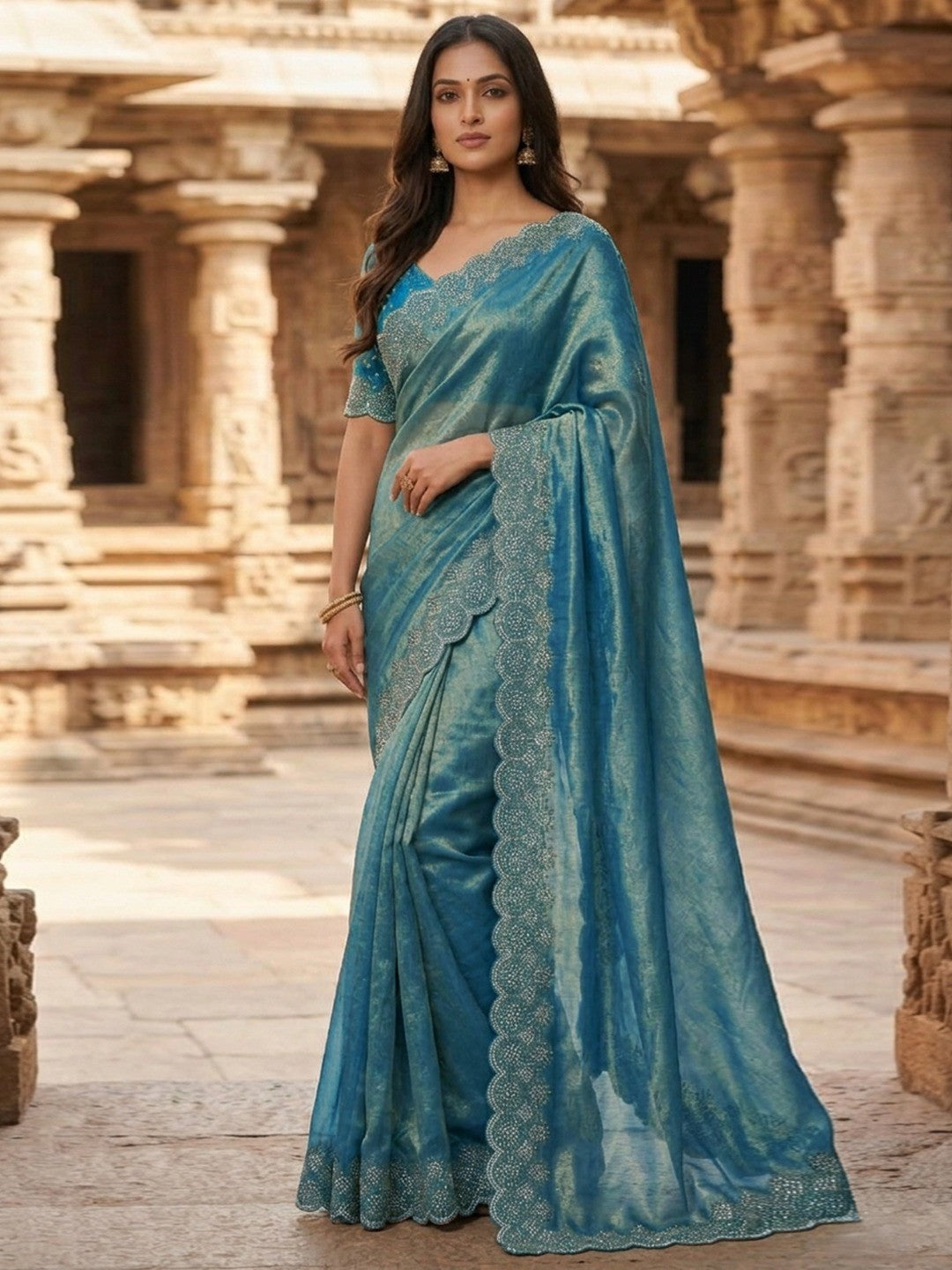 Graceful Teal Silk Blend Saree Accented With Swarovski Stone Work & Delicate Lace Border