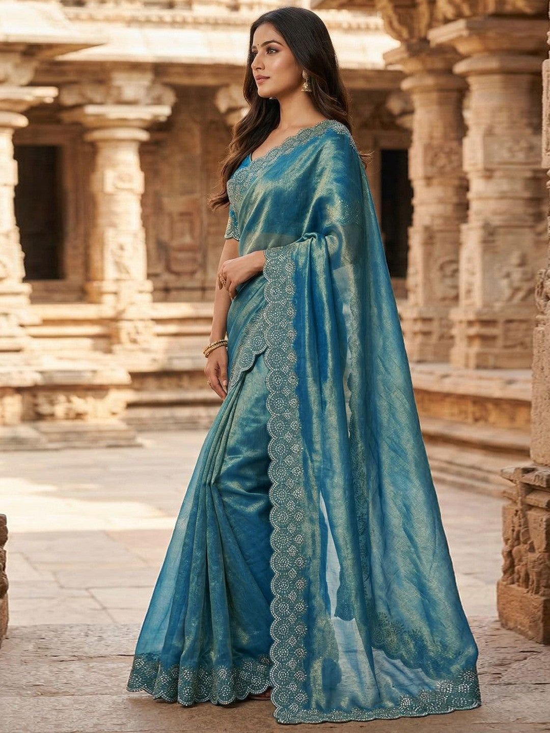 Graceful Teal Silk Blend Saree Accented With Swarovski Stone Work & Delicate Lace Border