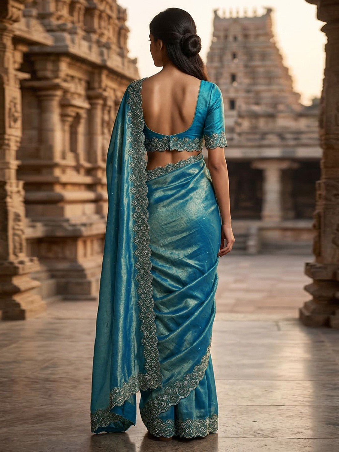 Graceful Teal Silk Blend Saree Accented With Swarovski Stone Work & Delicate Lace Border