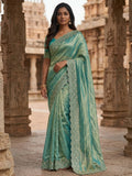 Graceful Turquoise Silk Blend Saree Accented With Swarovski Stone Work & Delicate Lace Border