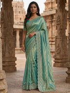 Graceful Turquoise Silk Blend Saree Accented With Swarovski Stone Work & Delicate Lace Border