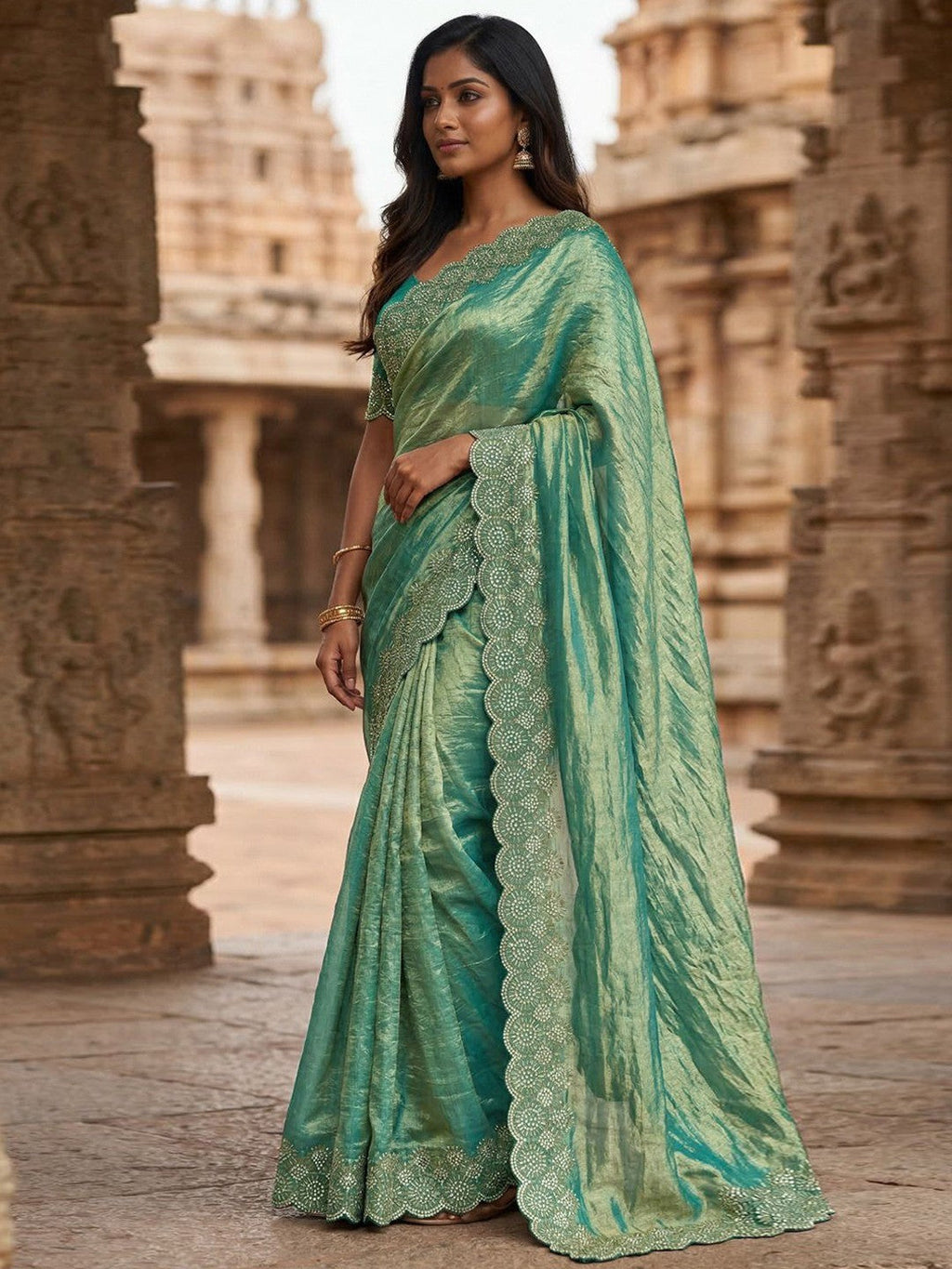 Graceful Turquoise Silk Blend Saree Accented With Swarovski Stone Work & Delicate Lace Border