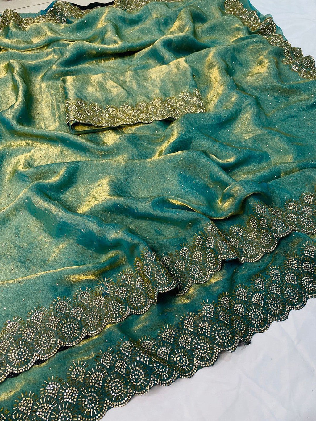 Graceful Turquoise Silk Blend Saree Accented With Swarovski Stone Work & Delicate Lace Border