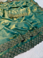 Graceful Turquoise Silk Blend Saree Accented With Swarovski Stone Work & Delicate Lace Border