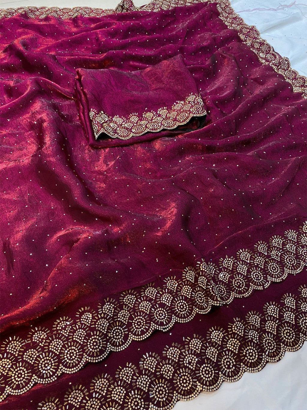 Graceful Wine Silk Blend Saree Accented With Swarovski Stone Work & Delicate Lace Border