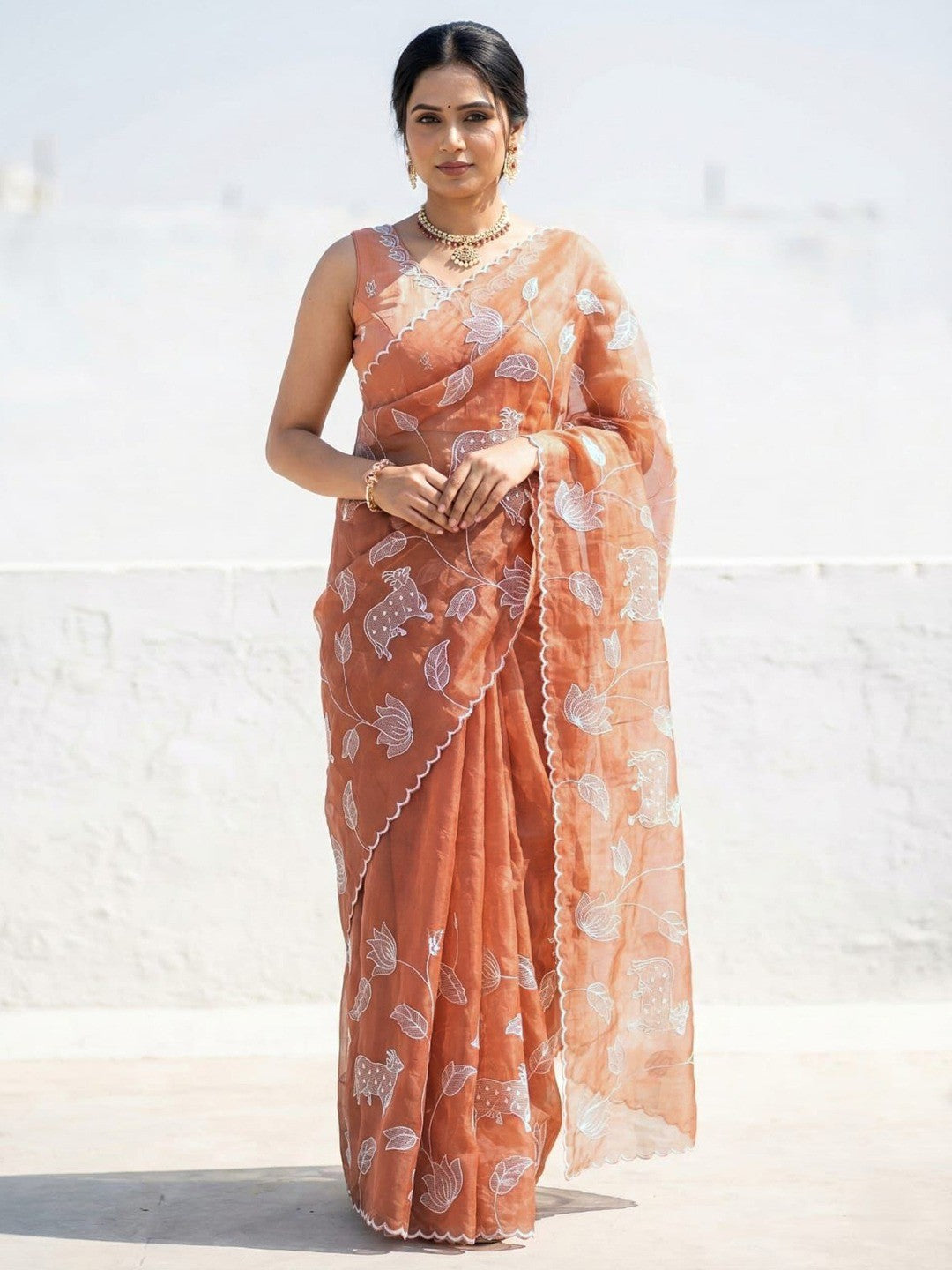 Premium Peach Silk Blend Saree Embellished With Floral & Animal Motif Thread Work