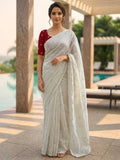 Elegant Cream Organza Satin Silk Saree Featuring Floral Butti Sequins Embroidery & Tassel Pallu