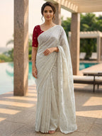 Elegant Cream Organza Satin Silk Saree Featuring Floral Butti Sequins Embroidery & Tassel Pallu