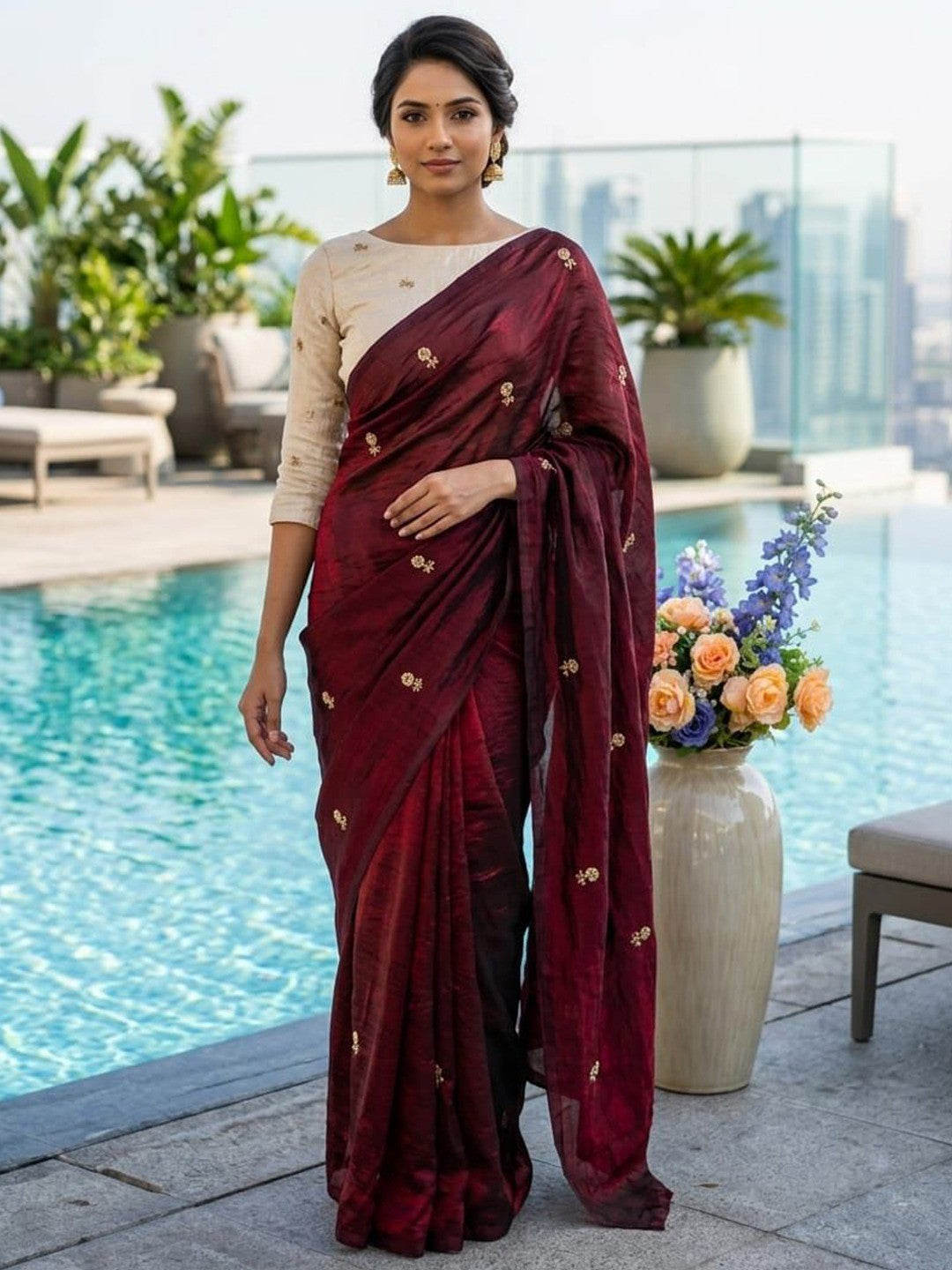 Elegant Maroon Organza Satin Silk Saree Featuring Floral Butti Sequins Embroidery & Tassel Pallu