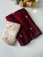 Elegant Maroon Organza Satin Silk Saree Featuring Floral Butti Sequins Embroidery & Tassel Pallu