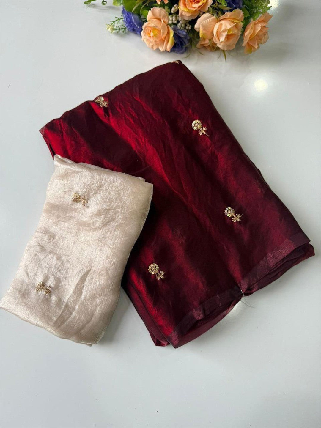 Elegant Maroon Organza Satin Silk Saree Featuring Floral Butti Sequins Embroidery & Tassel Pallu