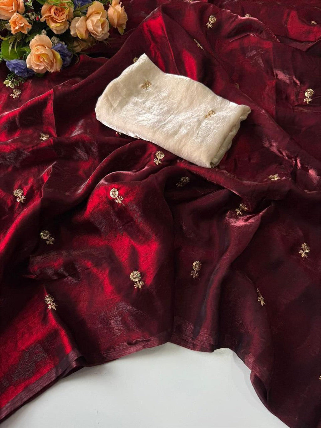 Elegant Maroon Organza Satin Silk Saree Featuring Floral Butti Sequins Embroidery & Tassel Pallu