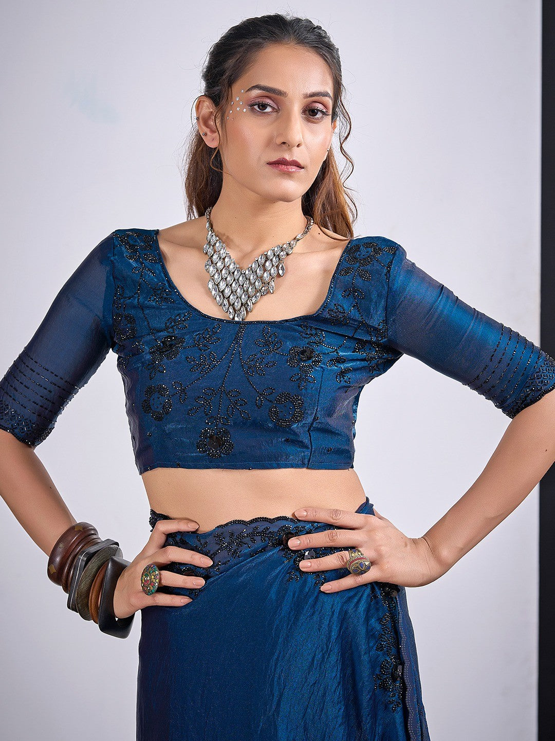 Glamorous Blue Satin Silk Saree Featuring Rich Stone Work With Cut Dana & Sequins