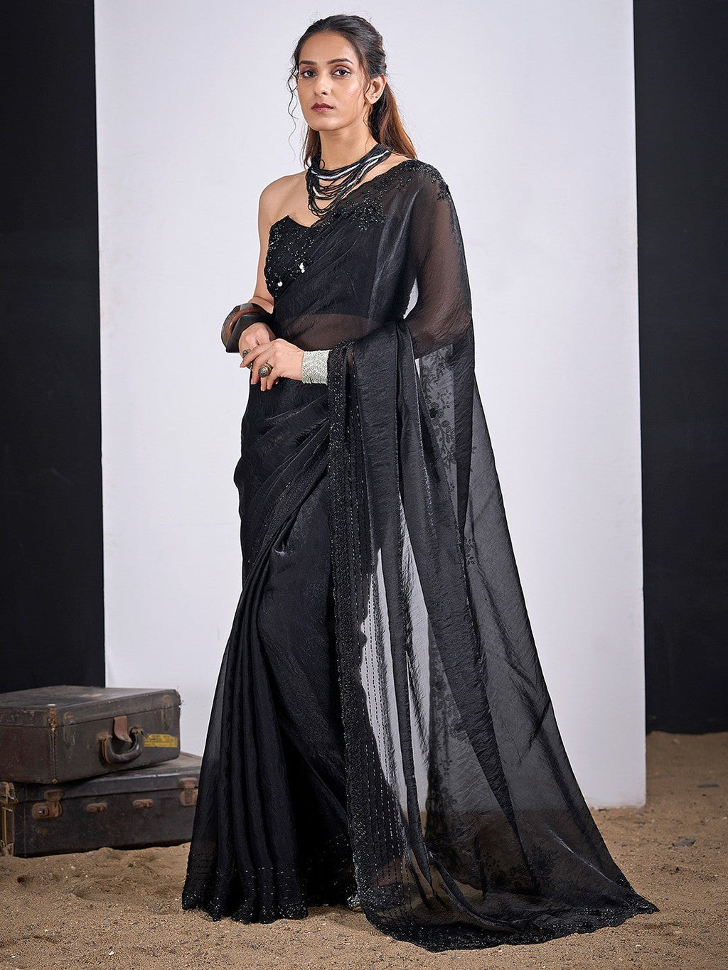 Glamorous Black Satin Silk Saree Featuring Rich Stone Work With Cut Dana & Sequins
