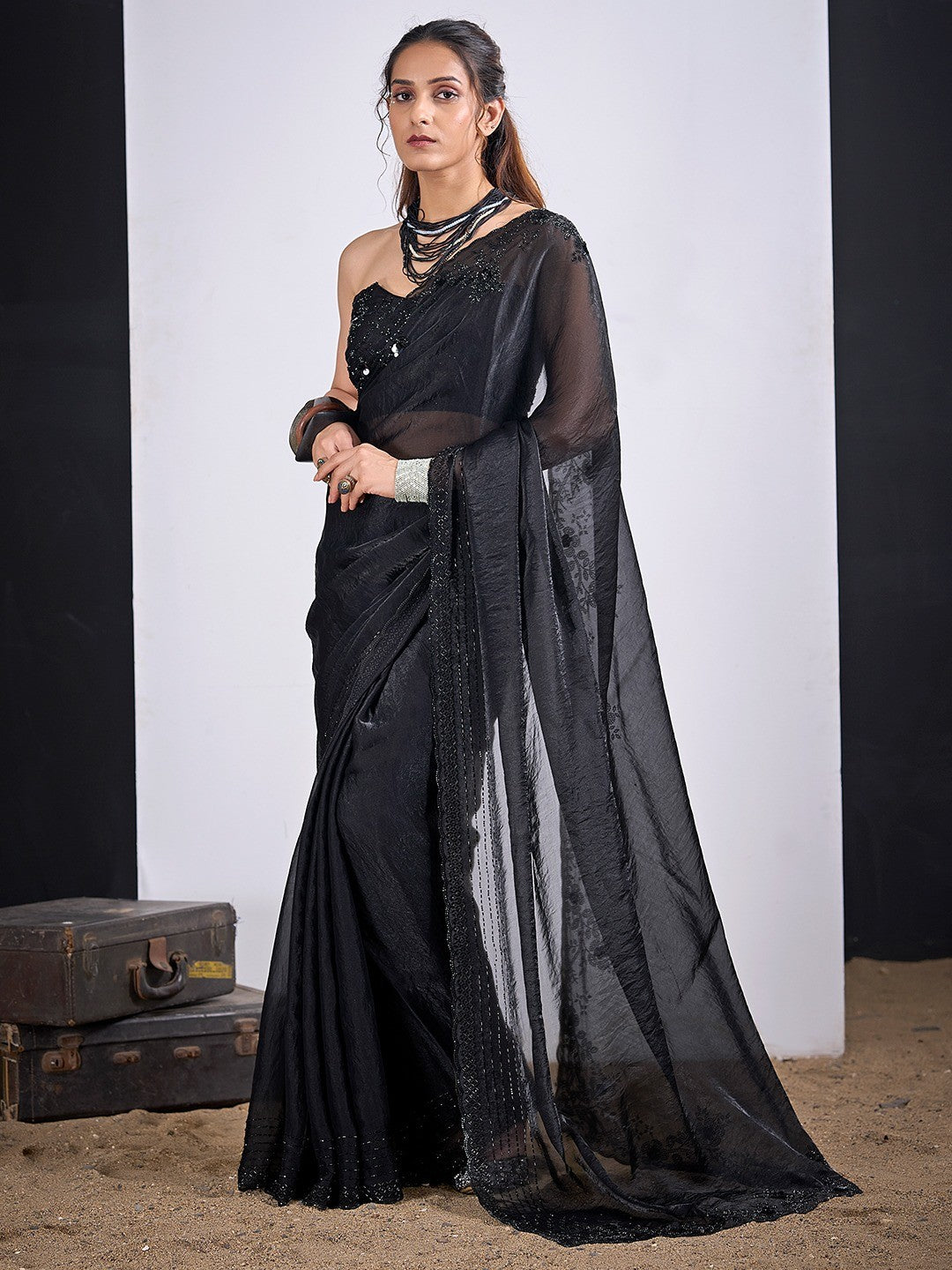 Glamorous Black Satin Silk Saree Featuring Rich Stone Work With Cut Dana & Sequins
