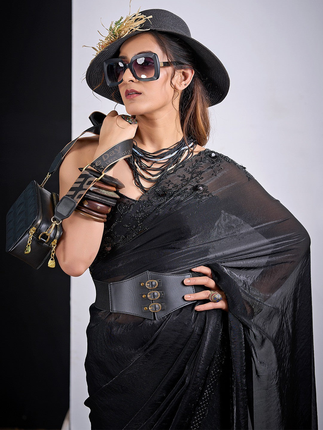 Glamorous Black Satin Silk Saree Featuring Rich Stone Work With Cut Dana & Sequins